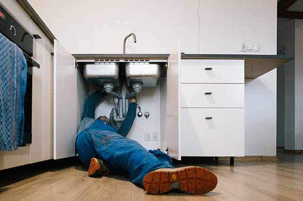 Professional Plumbing technician working in Meadows Of Dan, VA